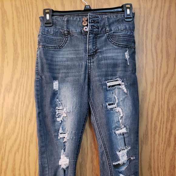 Cute skinny jeans/jeggings, distressed, holes, 3 button closure. Great Shape. - Picture 1 of 9